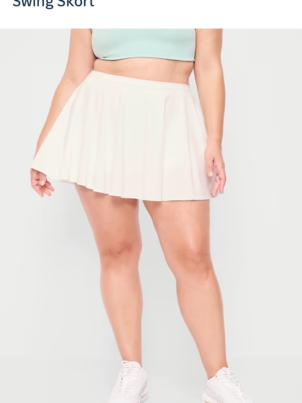 Old Navy White Pleated Swing Skort with built in biker shorts with a pocket.